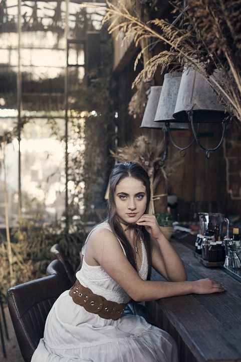 Book de 15 en Argentina, retrato con estilo bohemio en bar