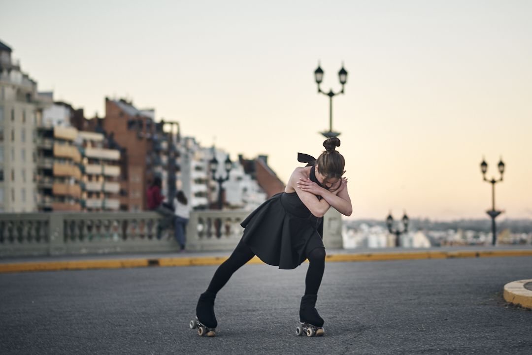 Book de 15 personalizado, fotos patinando con la ciudad de fondo